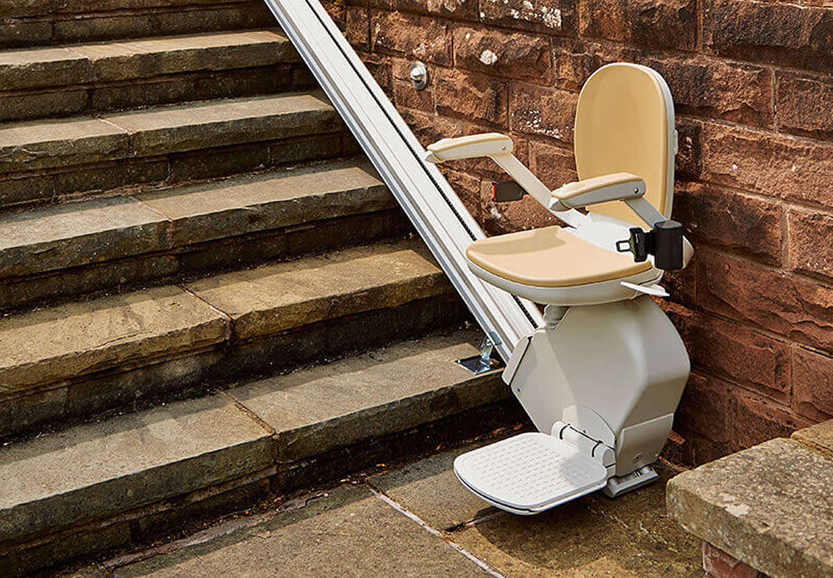 Acorn Outdoor robust stairlift designed for weathered exterior stairs, featuring rust-resistant materials and all-weather operation capability
